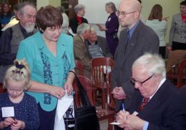 Author Ray Bradbury signs autographs at the grand opening of the Miller Center (2000), St. Cloud ...