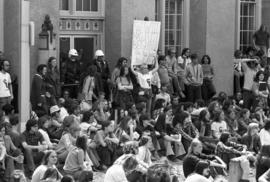 People listen to a speech, Day of Peace protest, St. Cloud State University