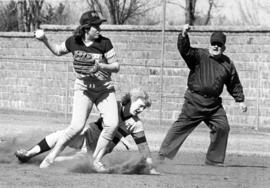 St. Cloud State University softball player Sarah Howard slides into second base in a game against Southwest State University