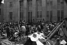 Protestors gather at a building, Day of Peace protest, St. Cloud State University