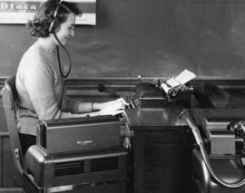 Lucille Pearson uses a dictaphone, St. Cloud State University