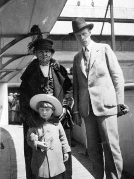 Sinclair Lewis, his mother-in-law, and son Wells leaving for Europe