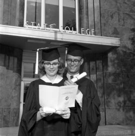 Two graduates in front of Stewart Hall (1948), St. Cloud State University