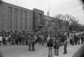 Protestors gather in a front of a building, Day of Peace protest, St. Cloud State University