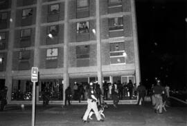 Police gather near Holes Hall (1965) during homecoming riots, St. Cloud State University