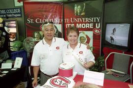 President Roy Saigo and his wife Barbara staff the St. Cloud State University booth at the Minnesota State Fair