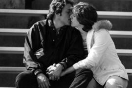 Man and a woman kiss, St. Cloud State University