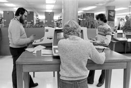 Patrons use the library's new online catalog, St. Cloud State University