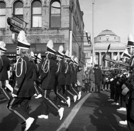 A marching band marches for the homecoming parade in downtown St. Cloud, St. Cloud State University