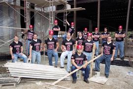 St. Cloud State University senior football players at a construction site