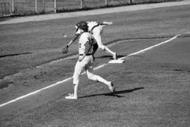 Scott Mansch tries to field a baseball during a St. Cloud State University baseball game against Augsburg College