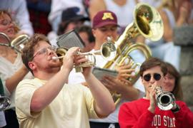 Band plays in the stands at a football game, St. Cloud State University