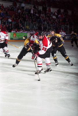 Action during a hockey game against Michigan Tech University, St. Cloud State University