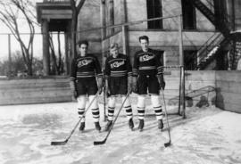 Three hockey players, St. Cloud State University