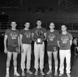 Men's basketball team members standing in Eastman Hall (1930), St. Cloud State University