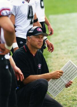 Randy Hedberg coaches during a football game, St. Cloud State University