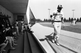 Bob Hegman walks in front of the dugout during a St. Cloud State University baseball game against Northern State University