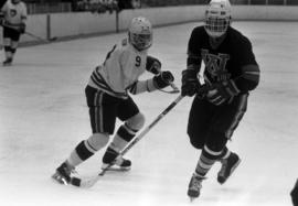 Hockey player Mike Turgeon watches the play against University of Wisconsin - Eau Claire, St. Cloud State University