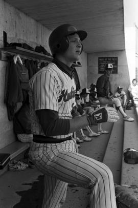 John King watches from the dugout during a St. Cloud State University baseball game against Northern State University