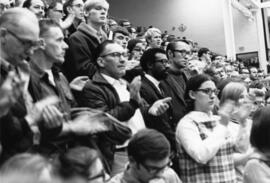 People stand together and clap, St. Cloud State University