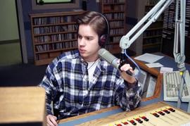 Trevor Leon broadcasts at KVSC studios, St. Cloud State University