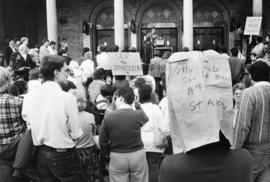 Protesters gather to hear a musician, St. Cloud State University