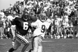 St. Cloud State University football player Curtis Washington defends against a North Dakota State University player during a football game