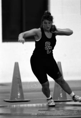 Sandra Dingmann readies to throw the shot put, St. Cloud State University