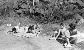 Swimmers relax at the 100 Acres Quarries