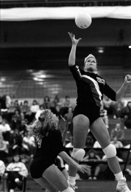 Sheri Mandell prepares to hit a volleyball during a volleyball match, St. Cloud State University