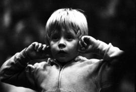 A young fan reacts to the action in the wrestling ring at Halenbeck Hall (1965), St. Cloud State University