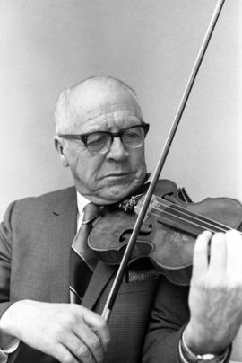 Harvey Waugh plays a violin, St. Cloud State University