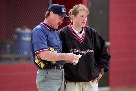 Paula U'Ren talks to an umpire at a St. Cloud State University softball game