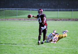 Keith Heckendorf plays quarterback during a football game against Augustana College, St. Cloud State University