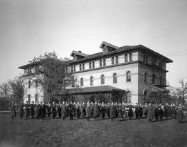 Female students exercise in front of Lawrence Hall (1885), St. Cloud State University