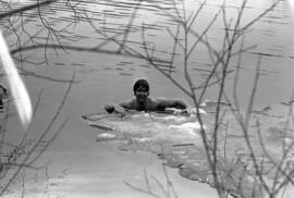 Gary Carlson swims across the Mississippi River, St. Cloud State University