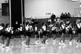 Cheerleaders perform at the St. Cloud State men's basketball game against Morningside College