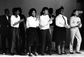 Students perform on a stage, St. Cloud State University