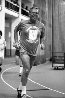 Wheelock Whitney runs in the new Halenbeck Hall (1965) fieldhouse, St. Cloud State University