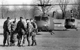 Soldiers get picked up by helicopter at Selke Field (1937), St. Cloud State University