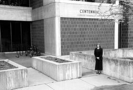 Kristi Tornquist in front of Centennial Hall (1971), St. Cloud State University