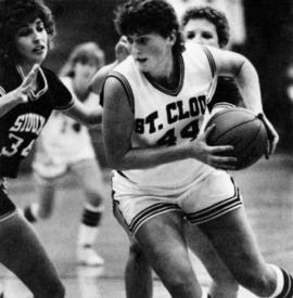 St. Cloud State University basketball player Julie Eisenschenk drives to the basket