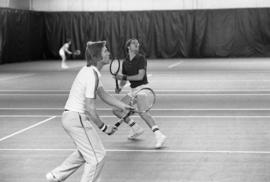 St. Cloud State tennis player Todd Holes plays in a match against University of Wisconsin-Stout