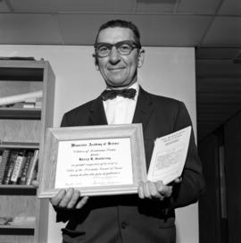 Harry Goehring with his award from the Minnesota Academy of Science, St. Cloud State University