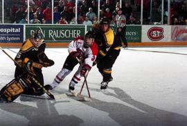 Action during a hockey game against Michigan Tech University, St. Cloud State University