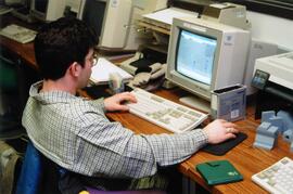 Student uses a computer, St. Cloud State University