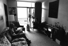 Two women sit in a living room, St. Cloud State University