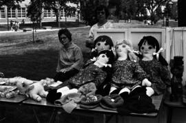 Dolls on a table, Lemonade Concert and Art Fair, St. Cloud State University