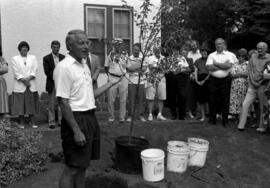 Basketball coach Butch Raymond speaks at Brady Watts tree dedication, St. Cloud State University