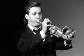 A man plays a trumpet during a jazz band concert, St. Cloud State University